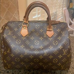 Louis Vuitton Monogram Canvas Speedy 30 Handbag.